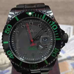Invicta Black and Green Watch with Date Display
